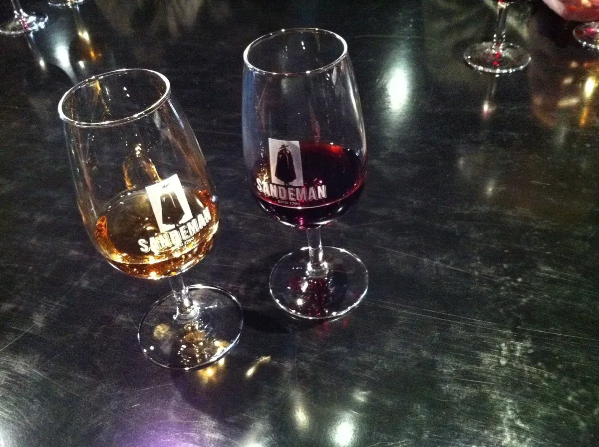 Amber tawny and deep red ruby port in Sandeman glasses, ruby vs tawny port